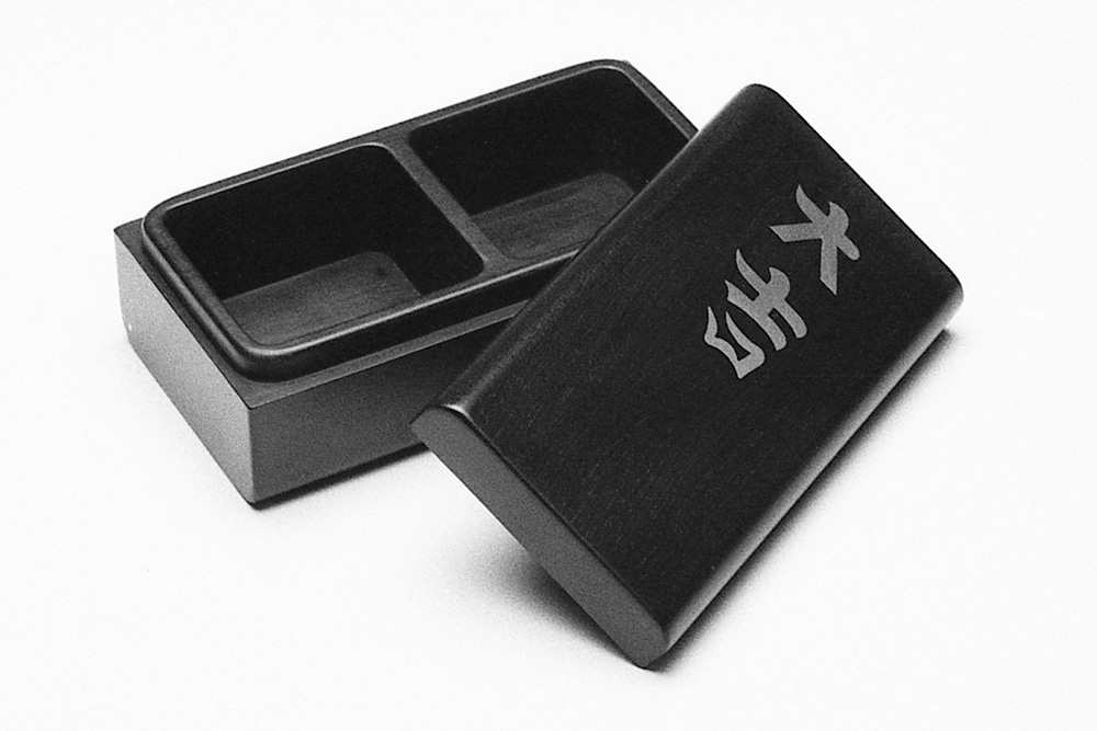 Ebony and silver inlaid solid box by Ian Harrold, made for an exhbition of jewellery and silver at Goldsmiths Hall, London, 1978